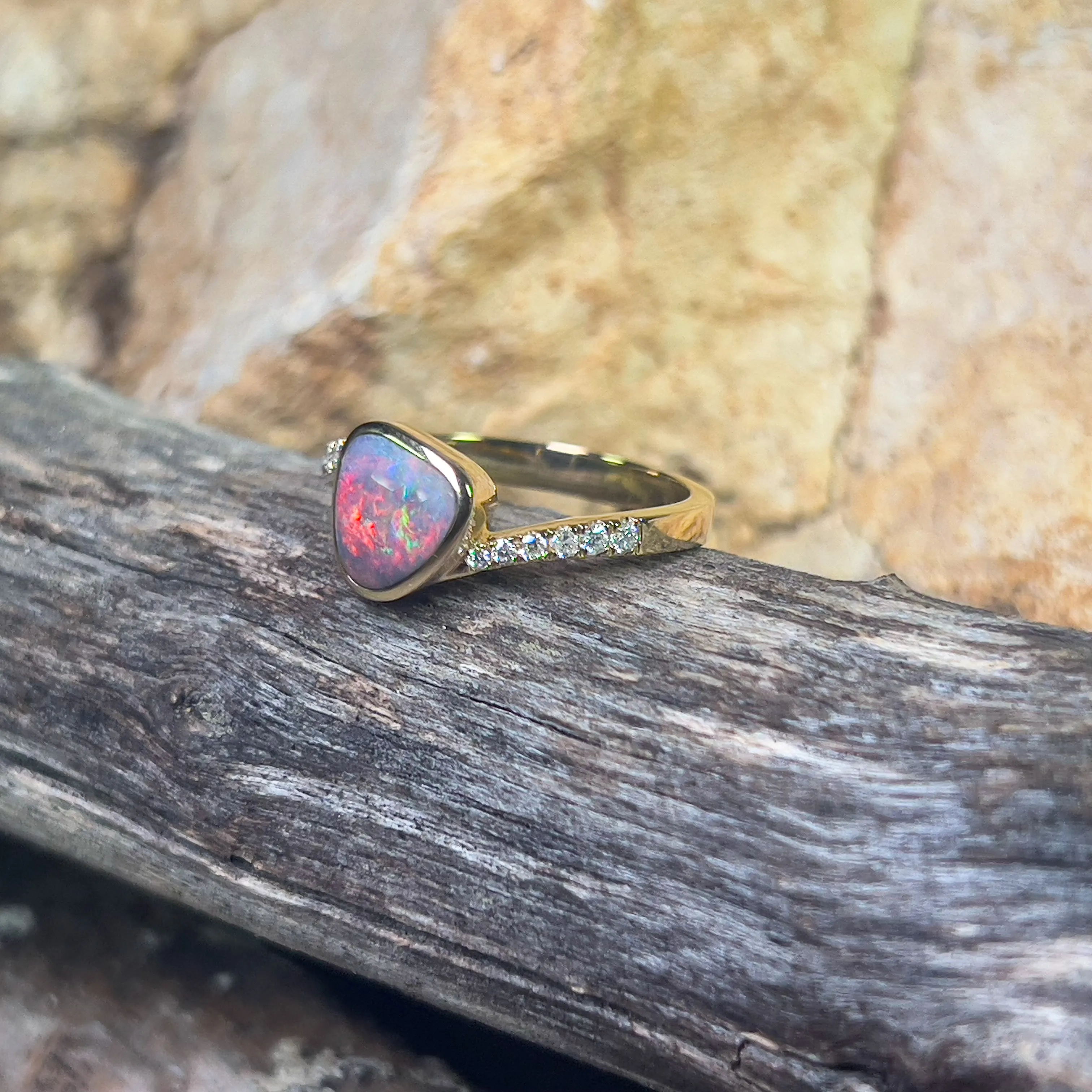 14kt Yellow Gold Black Opal 1ct and diamond ring