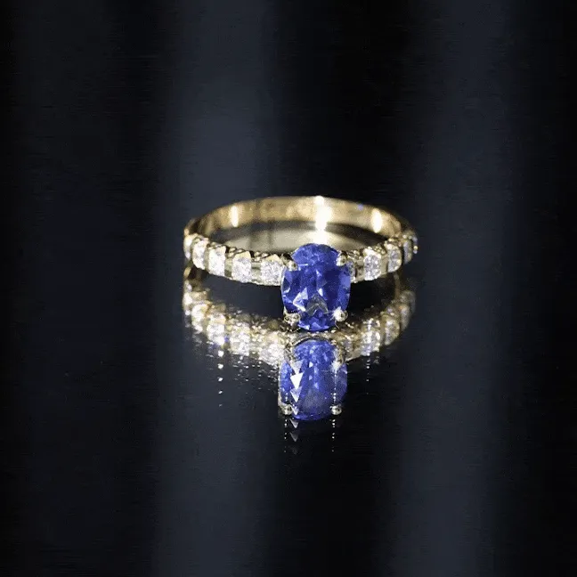 2.25 CT Oval Cut Created Blue Sapphire Solitaire and Diamond Side Stones