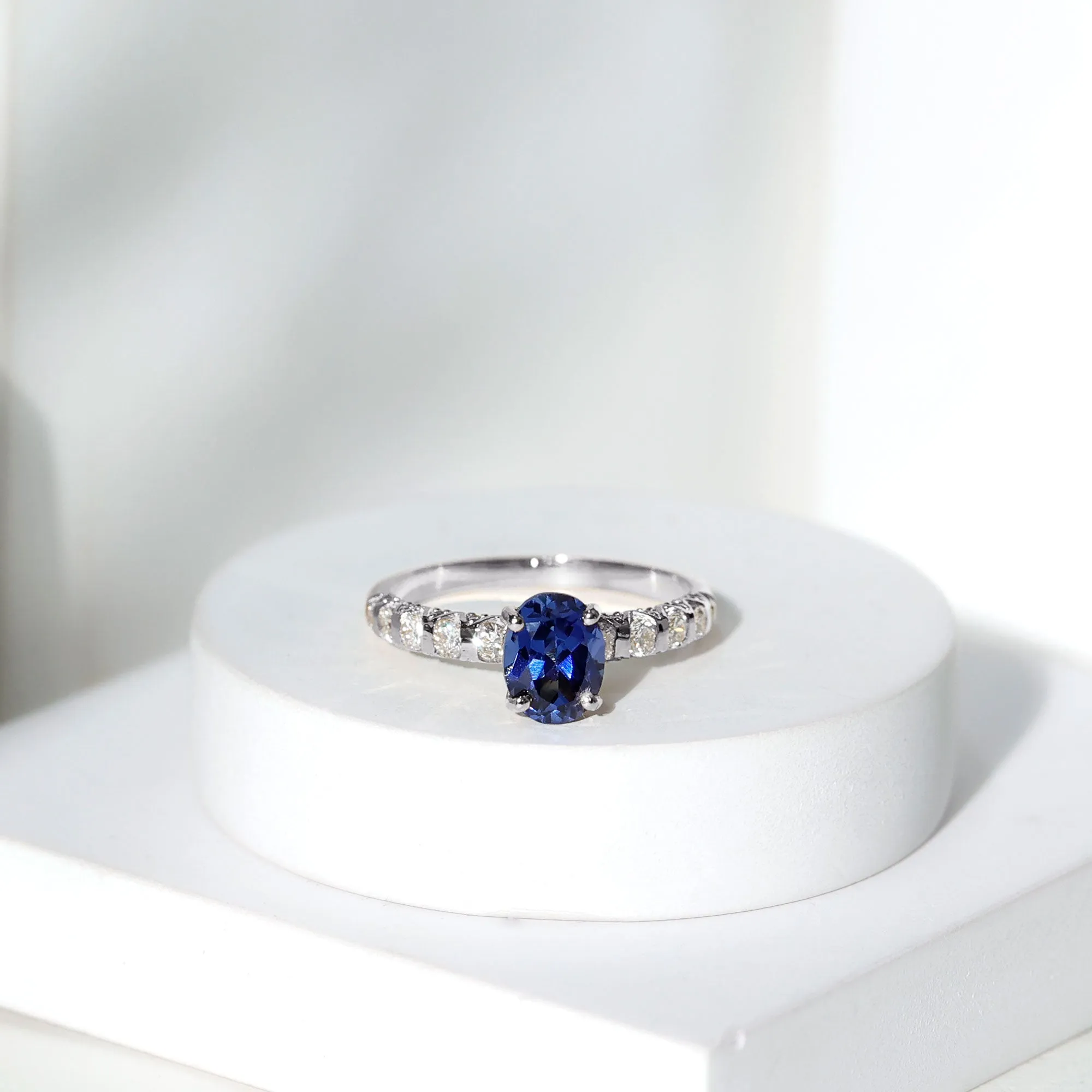 2.25 CT Oval Cut Created Blue Sapphire Solitaire and Diamond Side Stones
