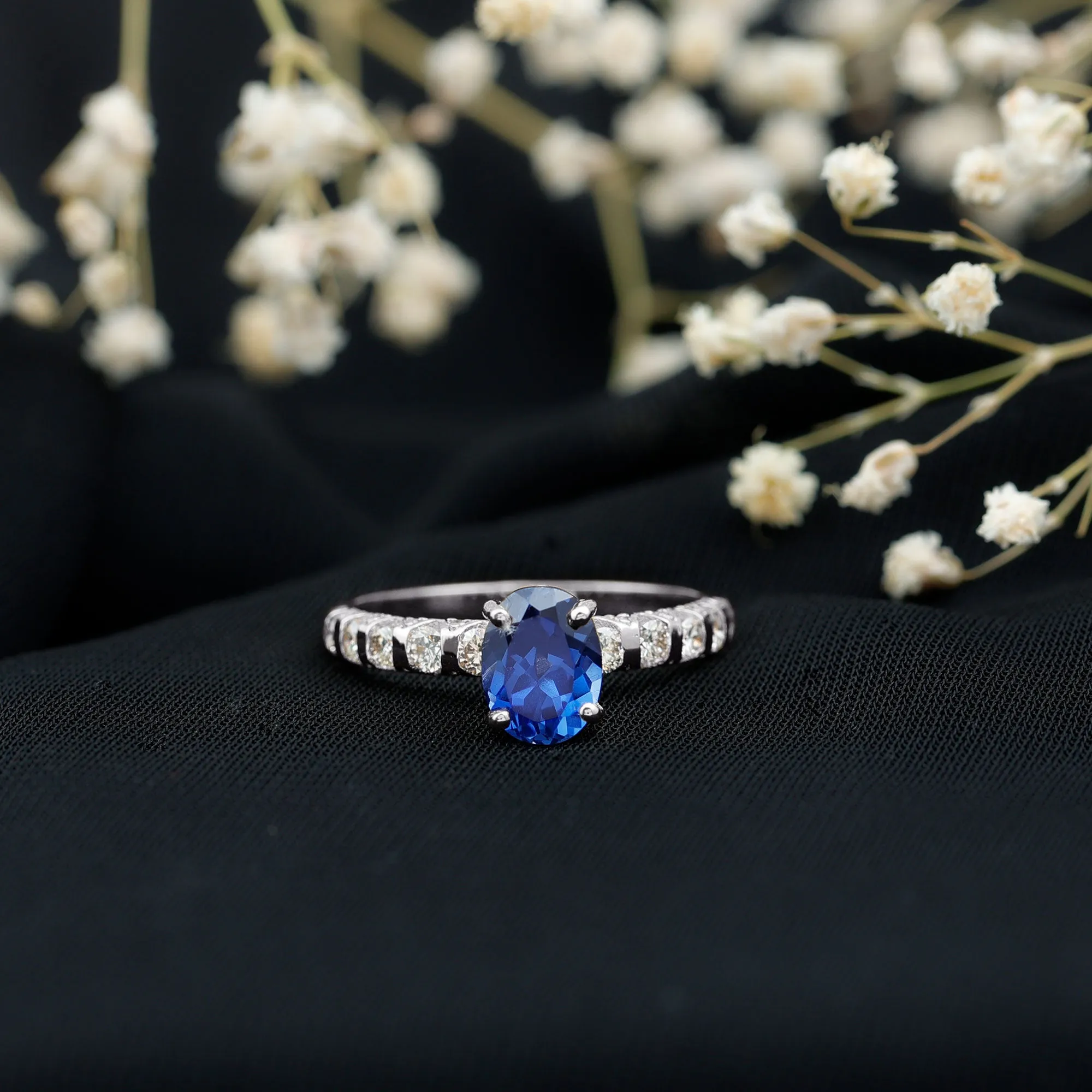 2.25 CT Oval Cut Created Blue Sapphire Solitaire and Diamond Side Stones