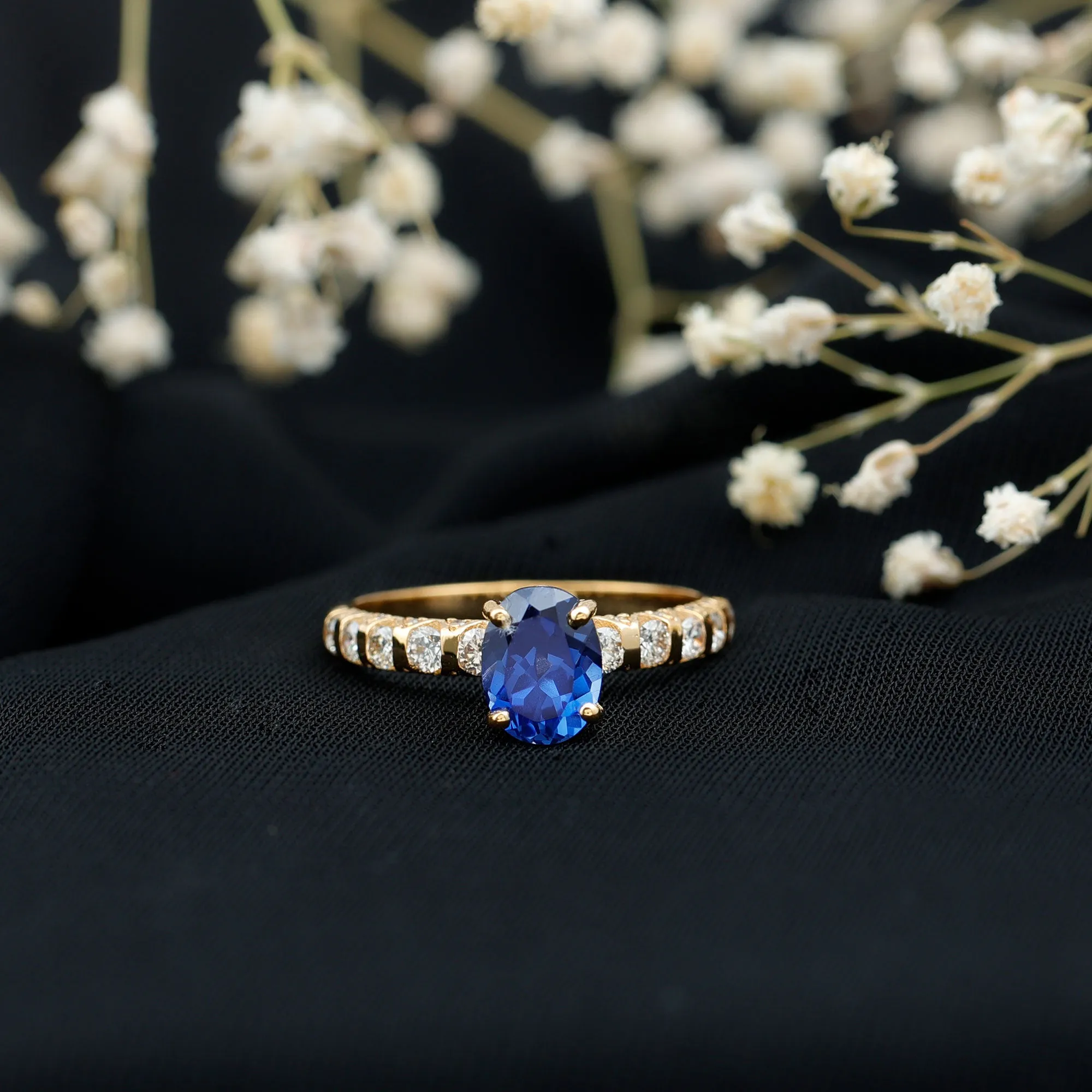 2.25 CT Oval Cut Created Blue Sapphire Solitaire and Diamond Side Stones