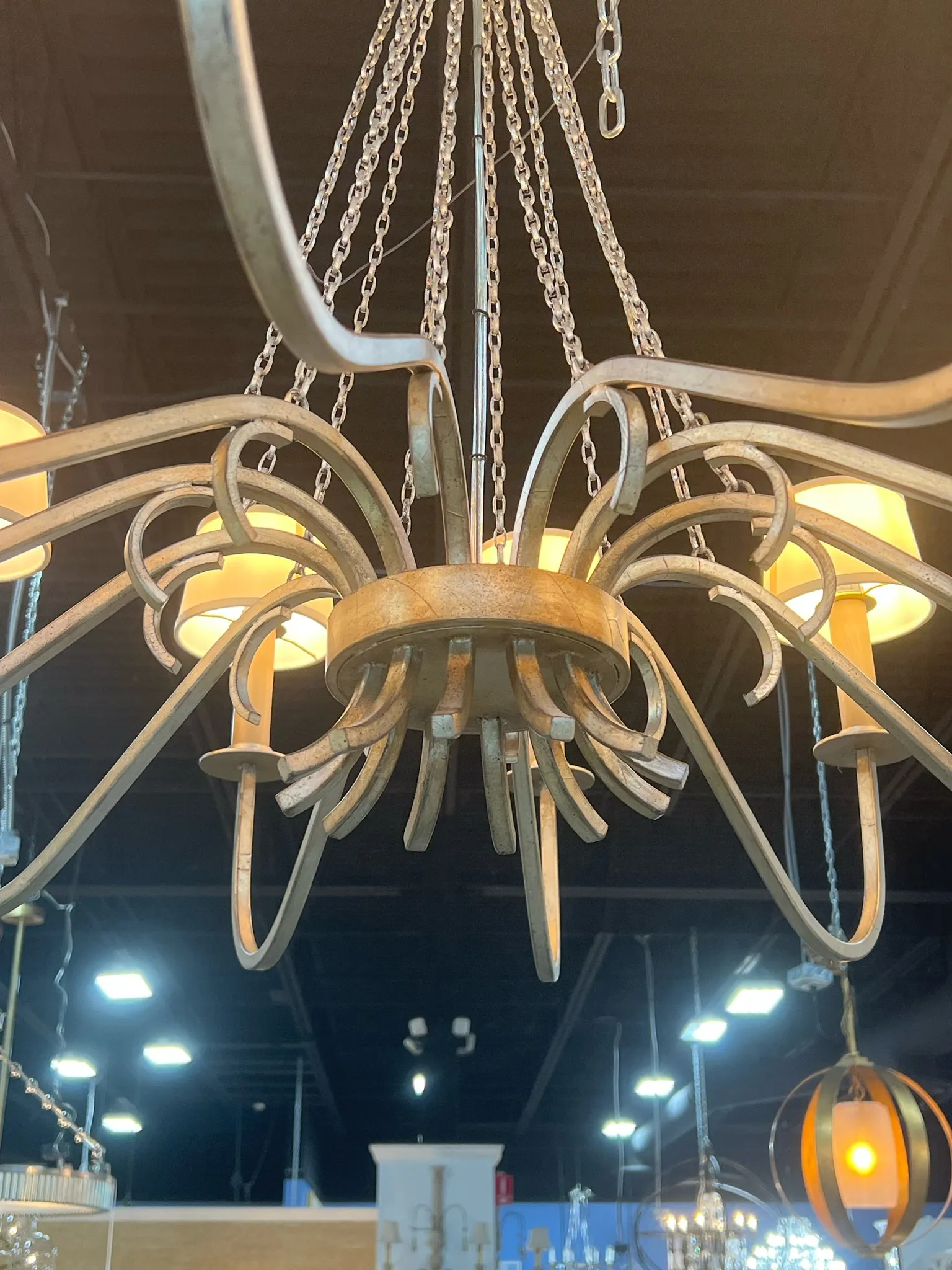CHANDERLER 12 ARM ANTIQUE SILVER FINISH CREAM SHADES
