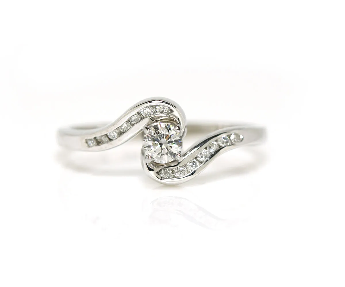 Curved Twist Diamond Channel Wedding Ring