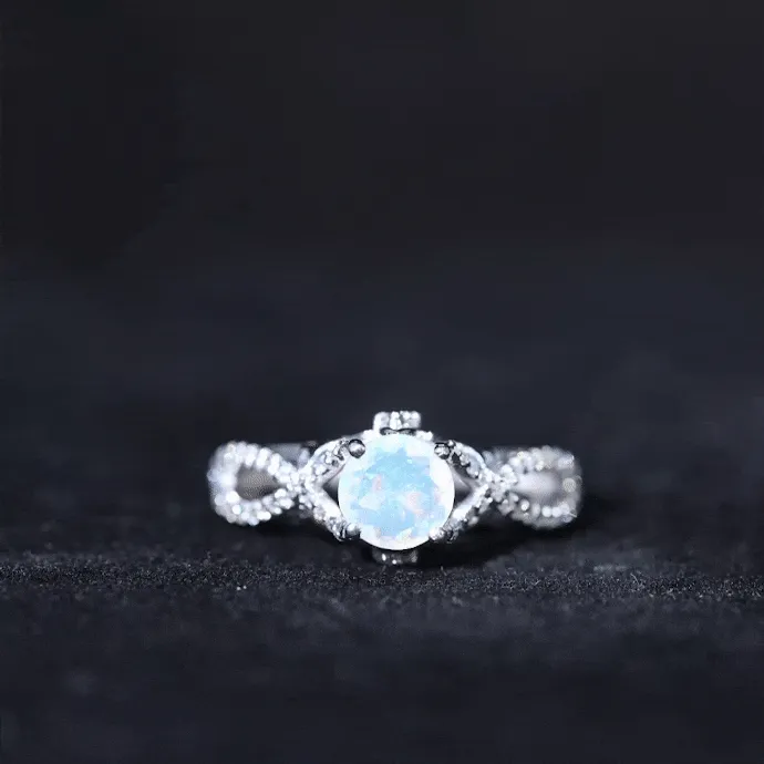 Designer Ethiopian Opal and Diamond Crossover Engagement Ring