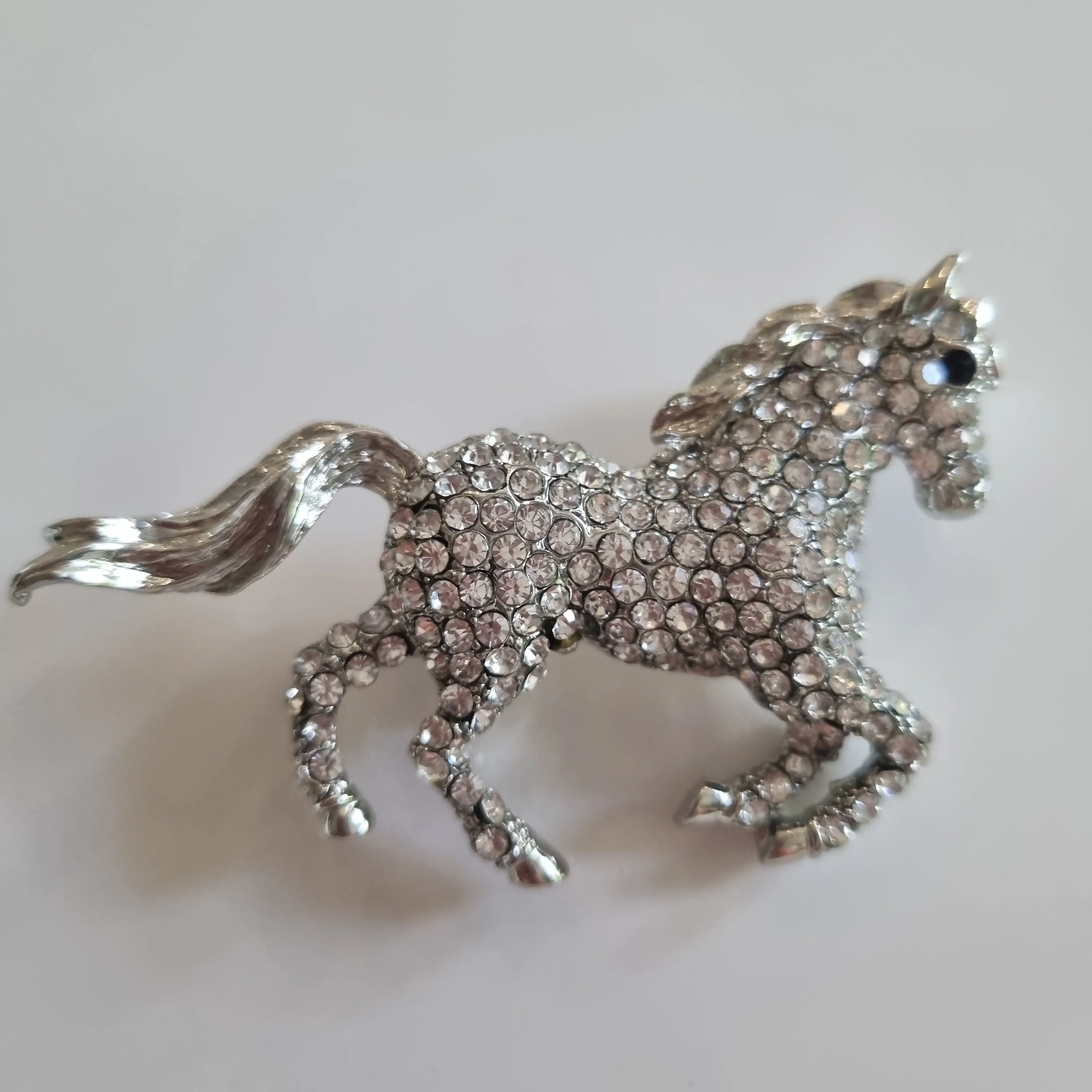 Horse brooch