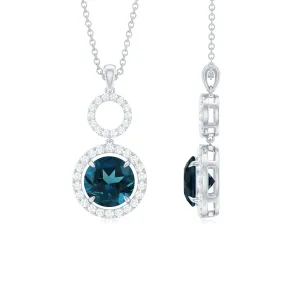 London Blue Topaz and Diamond Halo Dangle Pendant