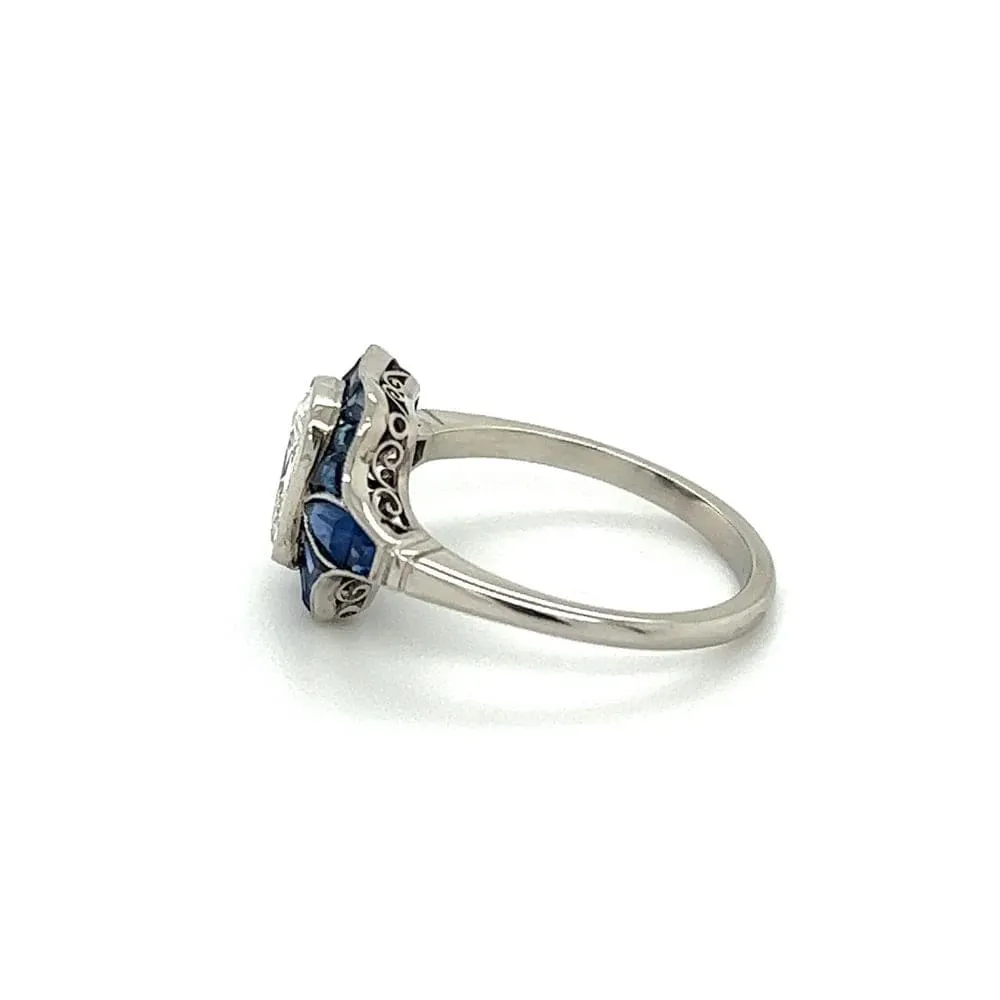 Platinum Ring With Old Miner Cut Cushion Diamond and Sapphires at Regard Jewelry in Austin, Texas