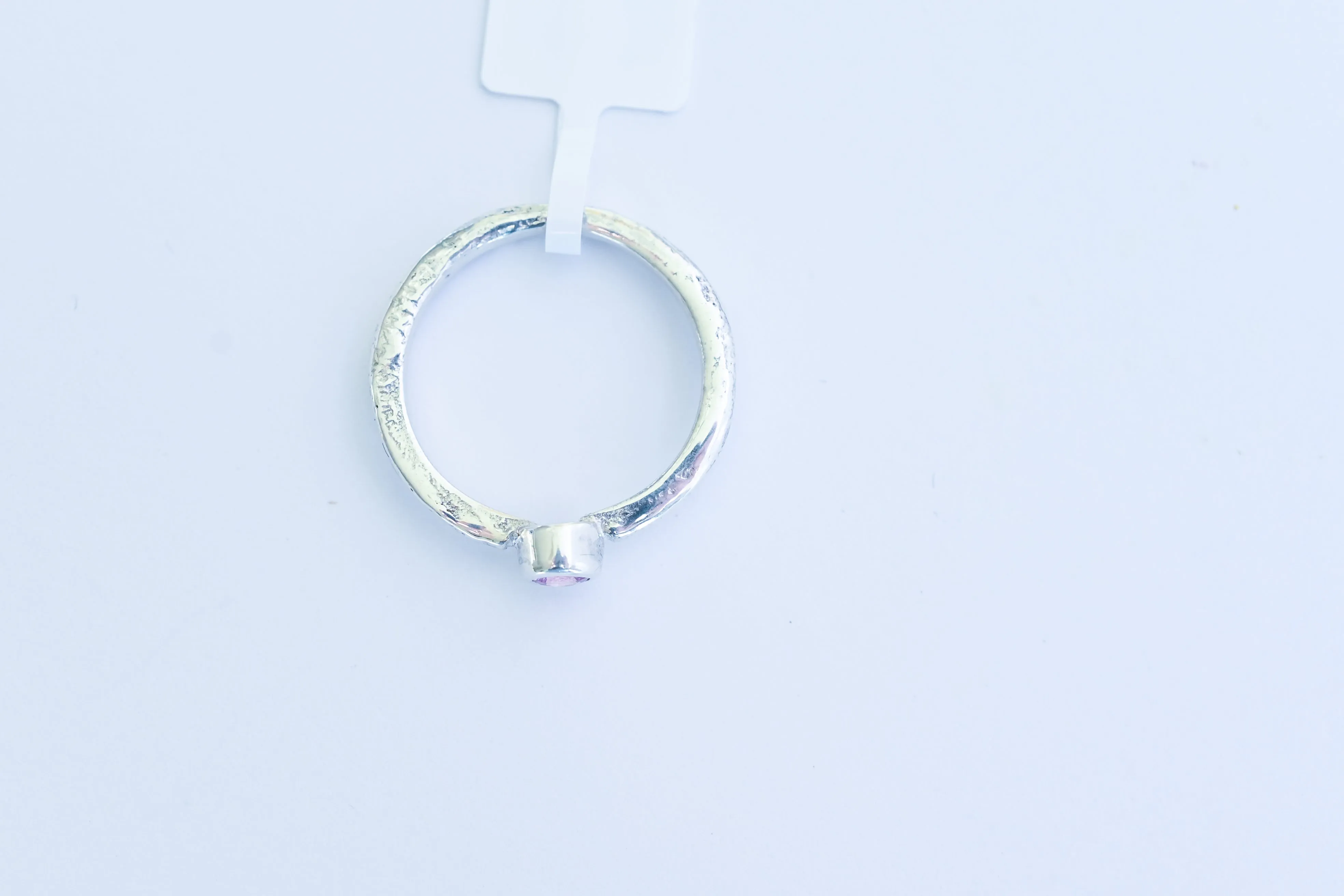 Silver ring with pink sapphire