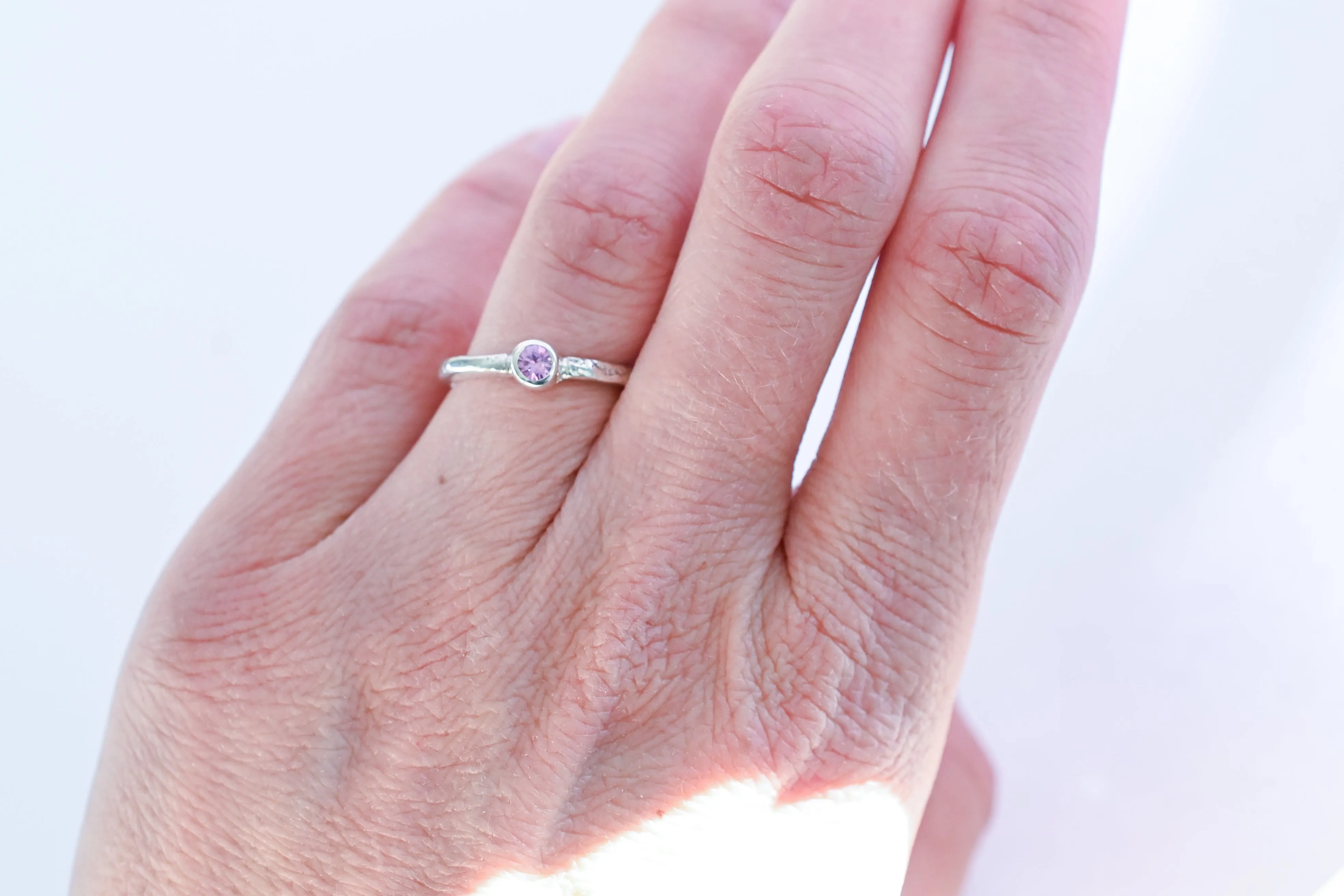 Silver ring with pink sapphire